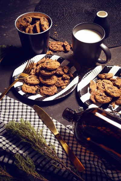 top view of vintage food dinner cookies biscuit sweet dessert bakery with decoration prop on wood table with white milk mug, vertical size