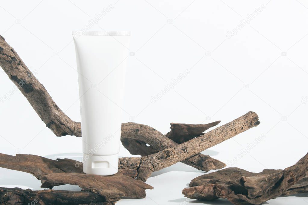 beauty spa medical skincare and cosmetic lotion bottle cream packaging product on white decor background with herbal wood branch