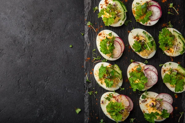 Stuffed Eggs Black Slate Board Copy Space Top View — Stock Photo, Image