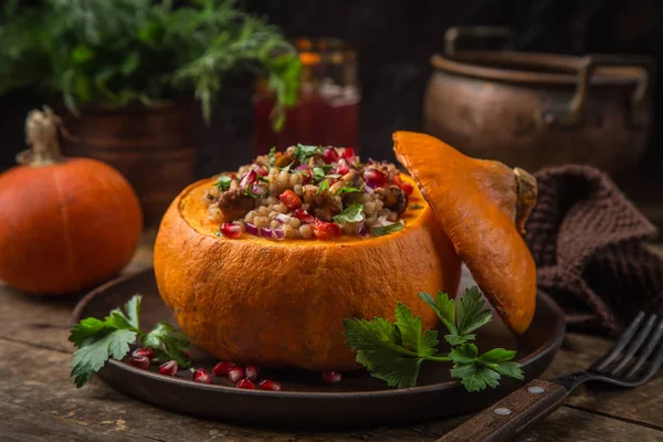 Whole Pumpkin Stuffed Barley Vegetables Served Pomegranate Parsley Rustic Background — Stock Photo, Image