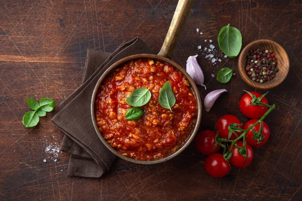 Traditional italian Bolognese sauce in saucepot — Stock Photo, Image