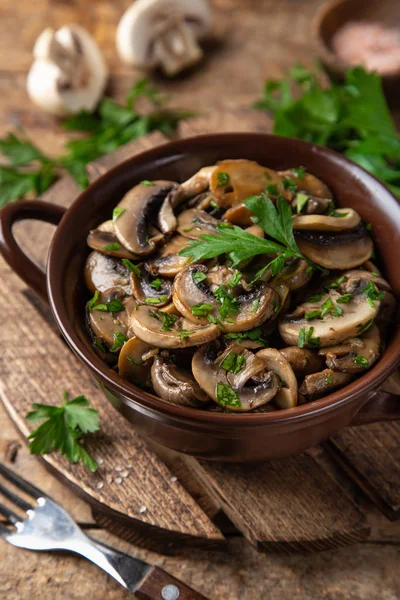 Fried champignon mushrooms with gurlic and parsley — Stock Photo, Image