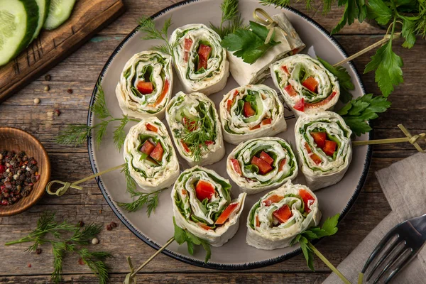 Vegetables and cream cheese roll ups — Stock Photo, Image