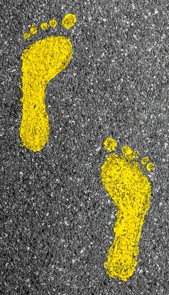 Footprints Yellow Feet Rough Asphalt — Stock Photo, Image