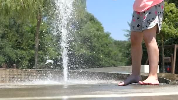 Slow Motion Barefoot Girl Legs Play Fountain Water Jets Summertime — Stock Video