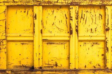 Portre sarı moloz kapsayıcı. arka plan olarak kullanılabilir.