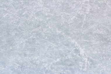Beyaz buz yüzeyi bir izleri paten tarafından sol ile kapatın. Ideal doku ve arka planlar.