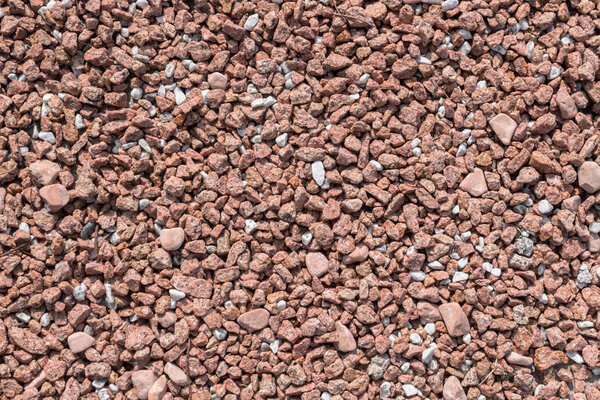 Closeup of little red pebbles. It can be used for texture and background
