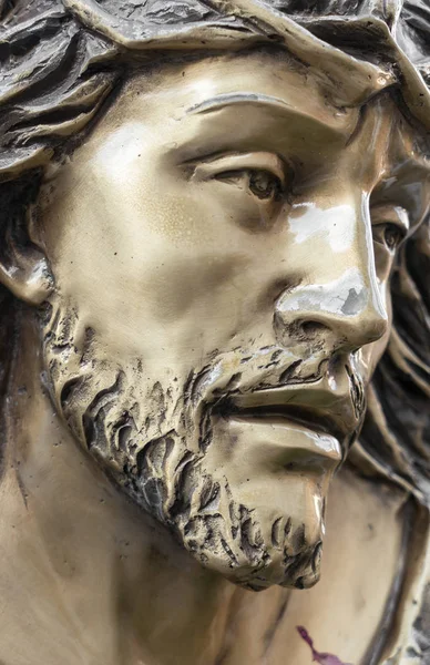 Bronze statue of the face of jesus. Ancient sculpture. Ideal for concepts or events like Easter.