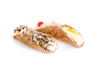 İki cannoli hamur işleri. Zengin ricotta krem ile dolu geleneksel Sicilya tatlı çikolata tahıl ile zenginleştirilmiş ve meyve şekerlenmiş.