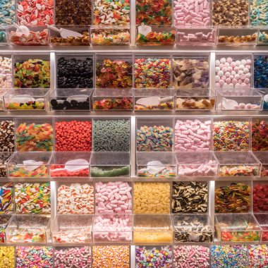 Self service display with many candies clipart