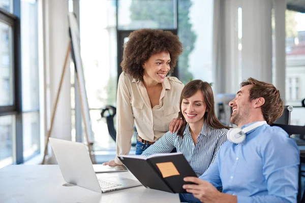 Three Colleagues Looking Agenda Assigning Tasks Multi Cultural Group Business — Stock Photo, Image