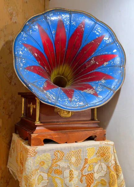 Ancient Gramophone Painted Red Lily Nightstand Stock Image