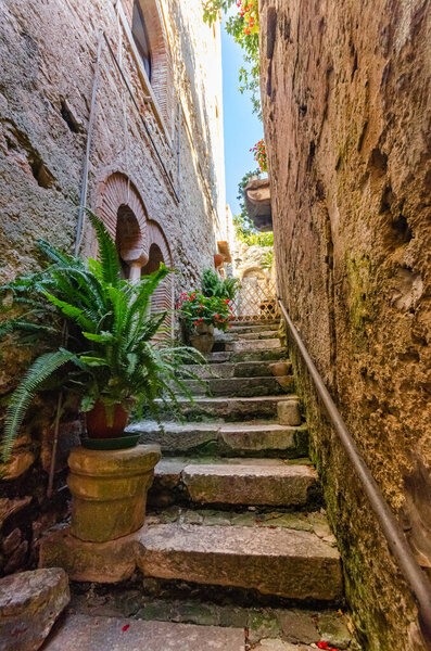 Stairs in the historic center of the city, with its narrow streets and ancient buildings, partly dating back to the Middle Ages.