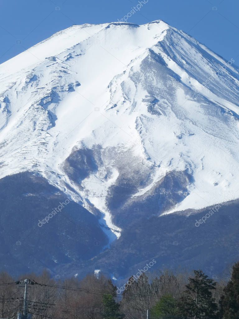 Landscape of Fuji Mountain at Fujiyoshida. Fuji is famous natural landmark. Close up and Focus on the top of the mountain.