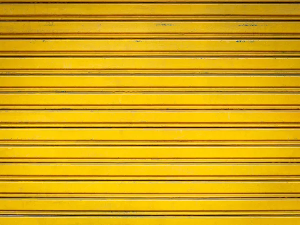 Old Yellow Rolling Iron Shutters Door Background Textured — Stock Photo, Image