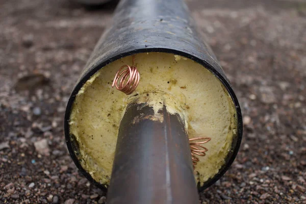 Pipe in polyurethane foam insulation. Thermal insulation of pipes. Pipes for heating and water supply networks.