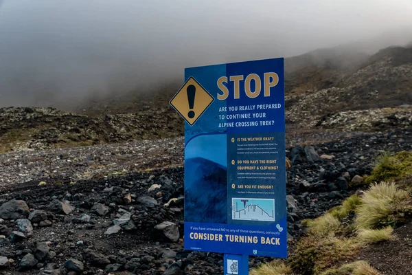 Stop sign at Tongariro Alpine trail Crossing, New Zealand
