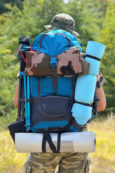 stock image Hiker with a backpack in the mountains