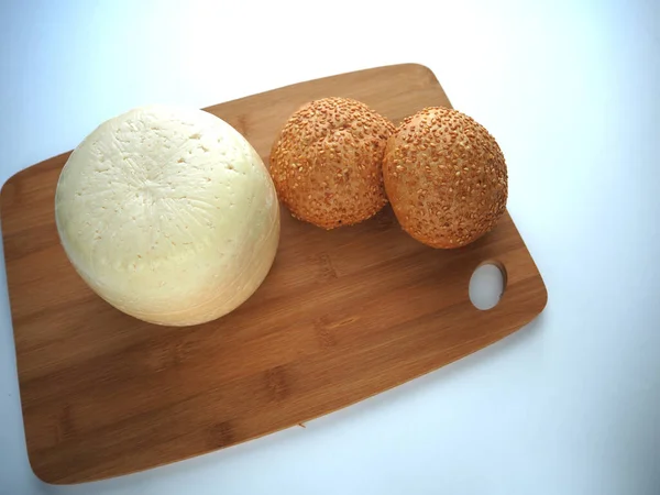 Cheese, round head with sesame bun.