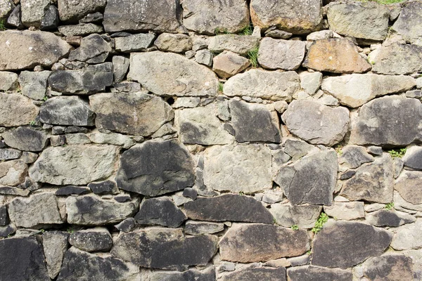 Sfondo del muro di pietra naturale . — Foto Stock