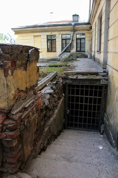 Entrance to the cellars behind bars.