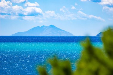 Tropical-like sea and sky in Italy in summer clipart