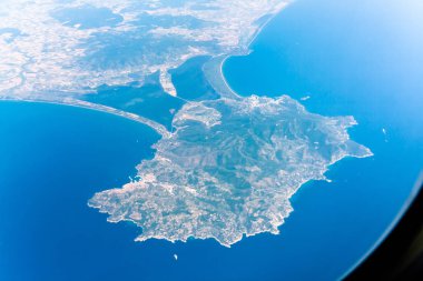 The Monte Argentario peninsula in Italy seen from above in summer clipart