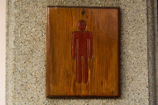 Segno di legno marrone uomini toilette — Foto Stock