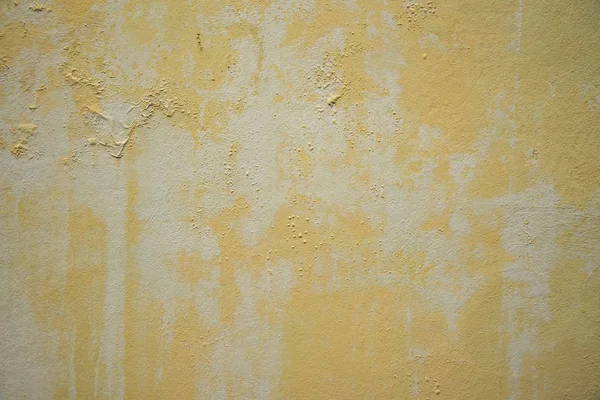 Grunge jaune fond de mur en pierre — Photo