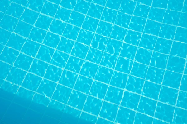 Water rippled on swimming pool water surface for background — Stock Photo, Image