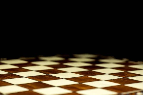 Papan catur abstrak pada latar belakang gelap — Stok Foto