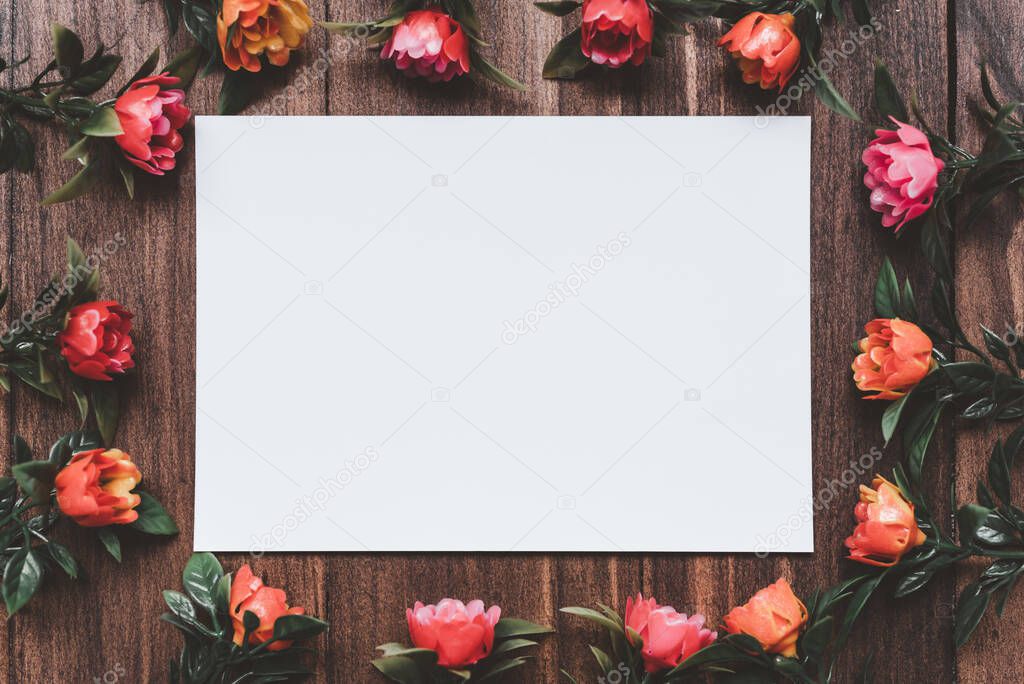 empty photo frames on wooden background
