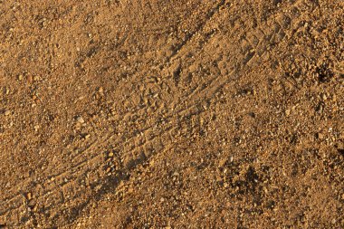 kahverengi sarı kum ve taş dokusu yakın yatay arkaplan, doğal arkaplan