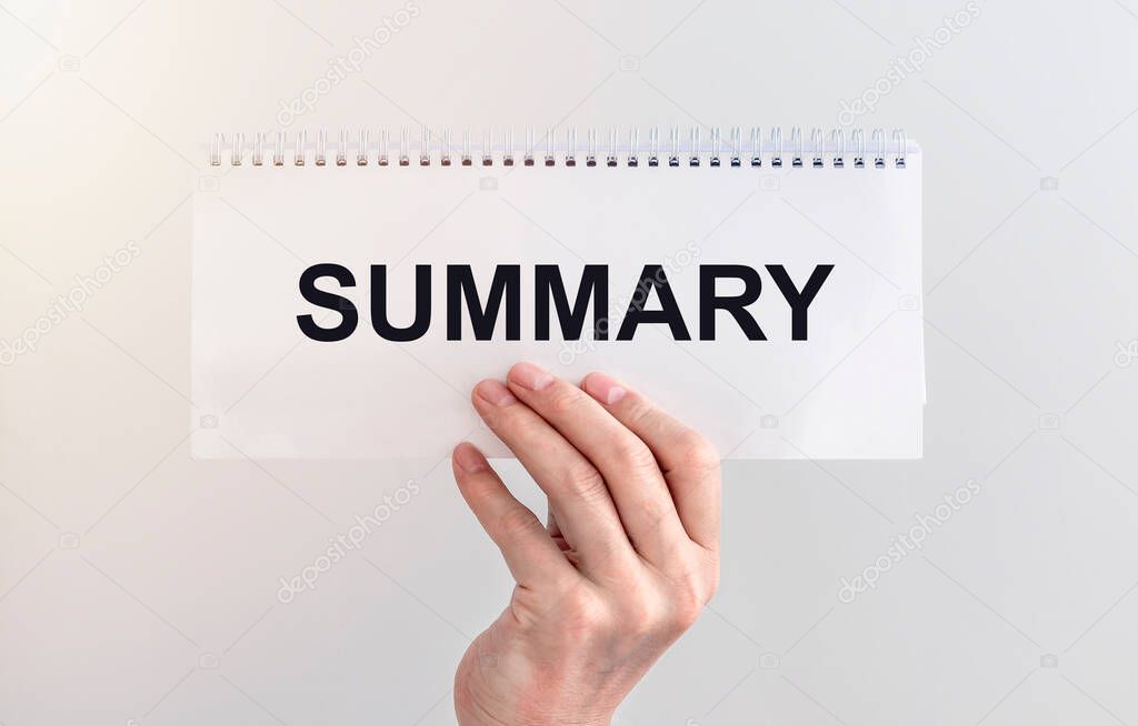 Summary word inscription, recap concept on paper in male hand