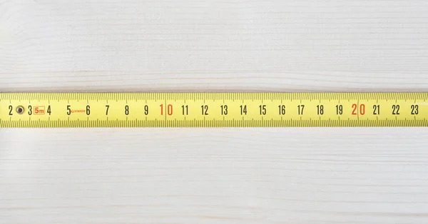 Yellow Tape Measure Wooden Table Copy Space Available Top Bottom — Stock Photo, Image