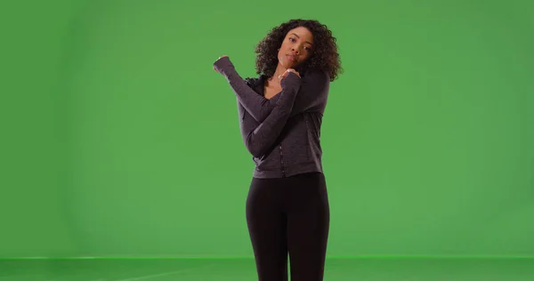 Healthy Black Woman Athlete Stretching Arms Workout Green Screen — Stock Photo, Image