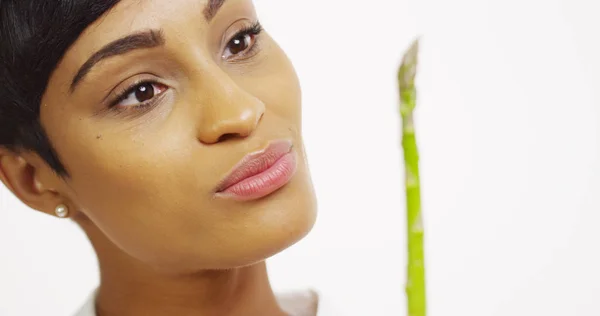 Close Black Woman Trying Asparagus Smiling — Stock Photo, Image