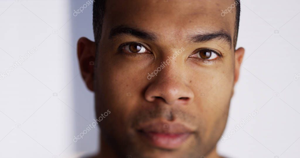 Black man looking at camera