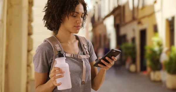 Cute Black Woman Tourist Texting Cell Phone Small Street Italy — стоковое фото