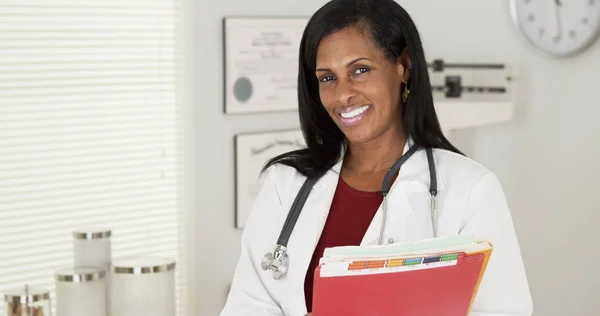Portrait Happy Black Doctor Holding Patient Files — Stock Photo, Image