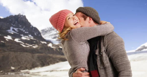 Girlfriend Wrapping Scarf Boyfriend Playfully Snow — Stock Photo, Image