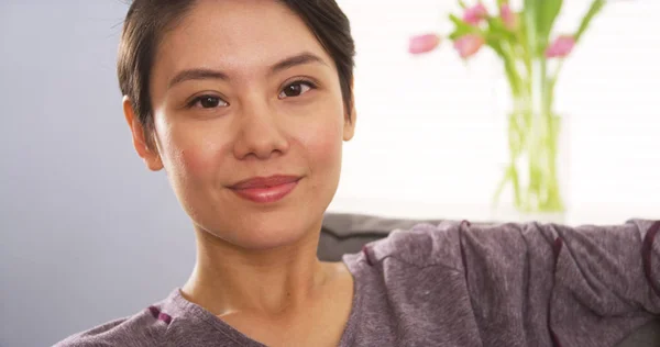 Attractive Chinese Woman Smiling Couch — Stock Photo, Image