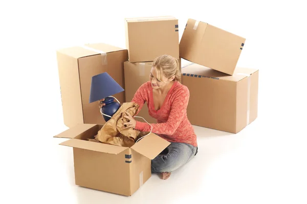 Young Woman Unpacking Cardboard Boxes — Stock Photo, Image