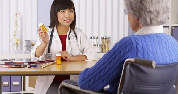 Asian Doctor Explaining Prescription Elderly Patient — Stock Photo, Image