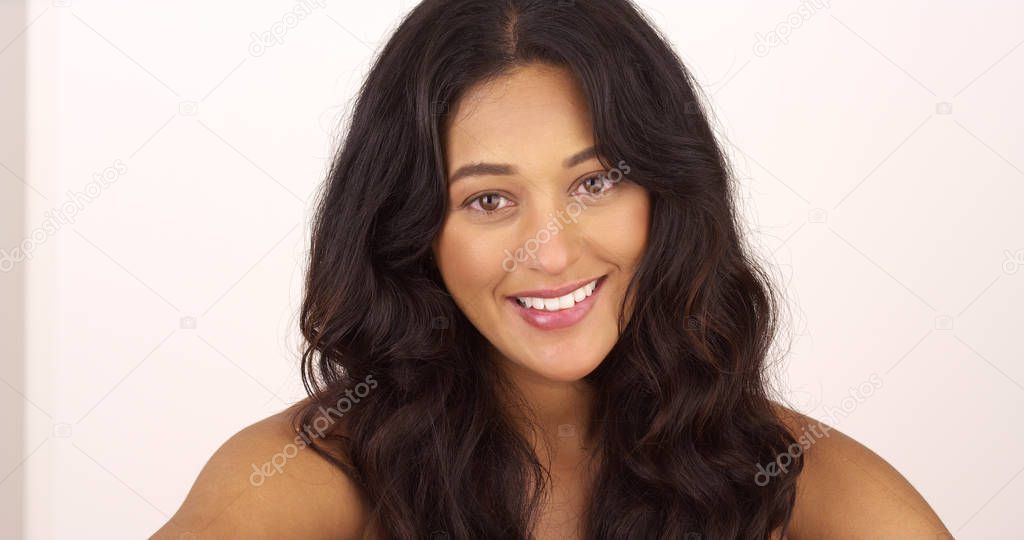 Hispanic woman smiling at camera