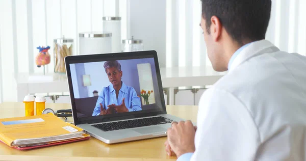 Mexican Doctor Video Chatting Mature Patient — Stock Photo, Image