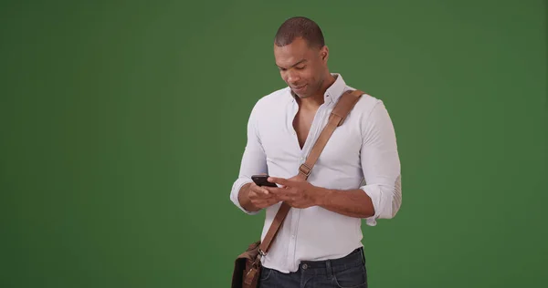 Young Black Man Using Mobile Phone Green Screen — Stock Photo, Image