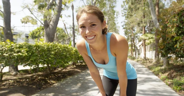 Young active healthy asian woman smiling