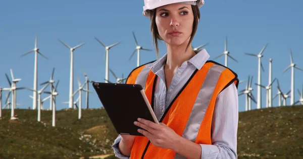 Woman Orange Vest Hardhat Working Tablet Wind Turbines Outdoors — Stock Photo, Image